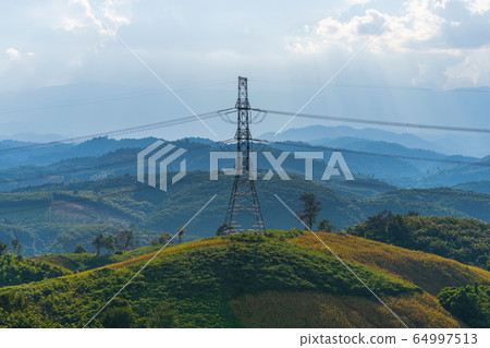 High voltage power lines on the mountain High voltage power lines on the mountain 64997513