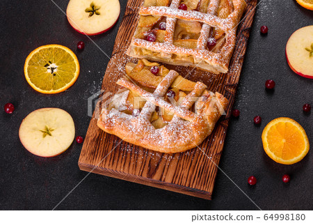 Delicious fresh pie baked with apple and pears 64998180