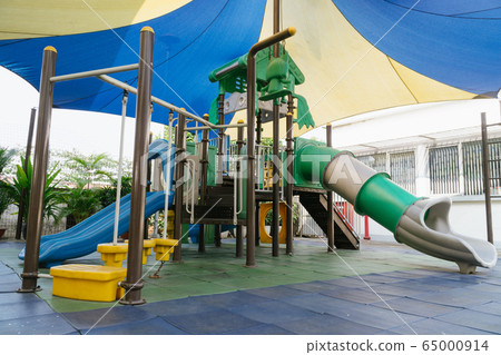 Outdoor public playground for kids in primary school under the shade Outdoor public playground for kids in primary school under the shade 65000914