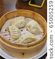 Chinese dumplings in a hot steamer 65005259
