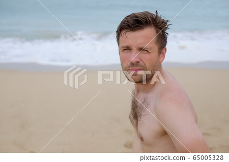 Portrait of an attractive caucasian young man on a 65005328
