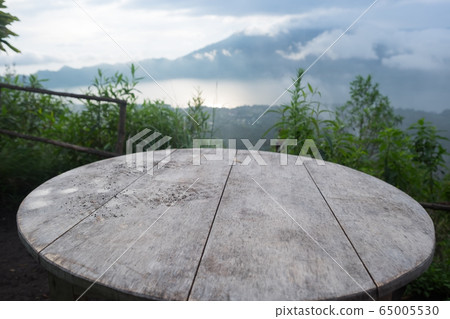 Empty dinner table and morning view over the 65005530