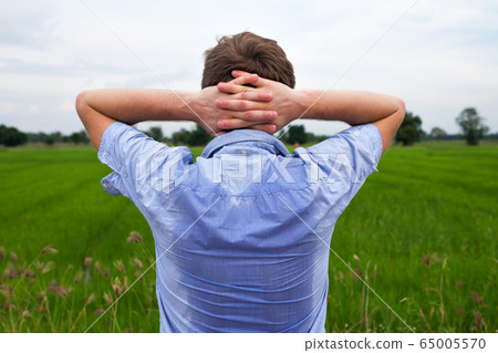 Man with hyperhidrosis sweating very badly under 65005570