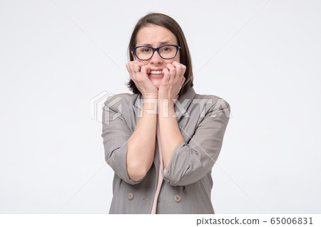 Angry mad crazy woman screaming out having a panic 65006831