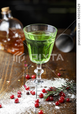 absinthe in a beautiful glass absinthe in a beautiful glass 65010529