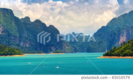 Beautiful mountains in Ratchaprapha Dam at Khao Sok National Park, Surat Thani Province, Thailand. 65010579