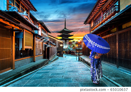 Asian woman wearing japanese traditional kimono at Yasaka Pagoda and Sannen Zaka Street in Kyoto, Japan. 65010637
