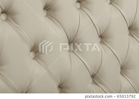 Beige leather capitone background texture Beige leather capitone background texture 65013792