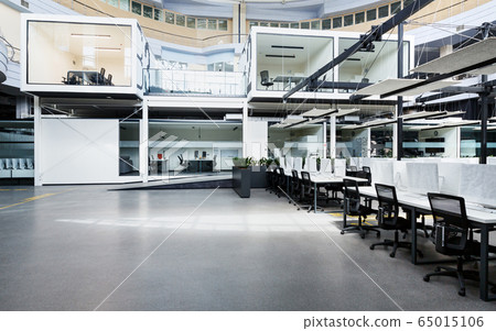 Big rental open space with wrapped computers, no workers 65015106