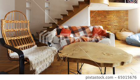 Relax zone with armchair and round table 65015676