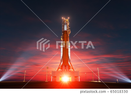 Space Launch System On Launchpad Over Background Of Sunrise 65018330