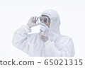 a doctor wearing protective suit. 65021315