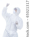 Scientists in protective clothing wearing celebrating  65021317