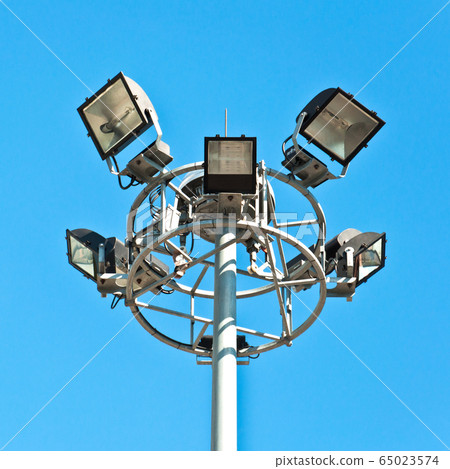 street light against blue sky 65023574