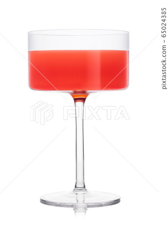 Cosmopolitan cocktail in modern crystal glass on 65024385