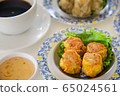 fried Dumpling traditional chinese food with souce 65024561
