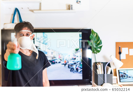 Young asian man funny created mask from brassiere Young asian man funny created mask from brassiere 65032214