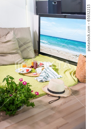 Staged scene house with picnic place on plaid Staged scene house with picnic place on plaid 65032215