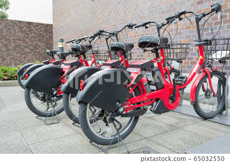 Row of bicycles parking for rent Row of bicycles parking for rent 65032550