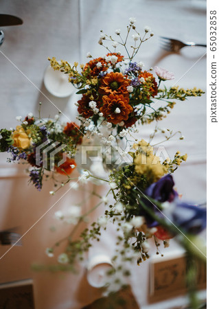 photo of flowers on a table from above 65032858