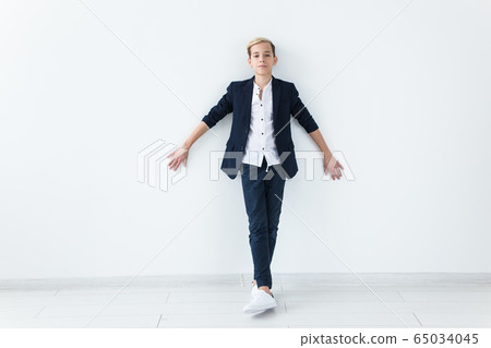 Teenage depression and puberty concept - Sad teenager portrait close up on white background. 65034045