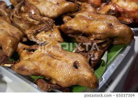 Thai cooked ducks are on the counter in the market Thai cooked ducks are on the counter in the market 65037304