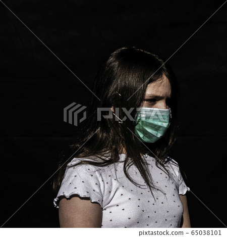 Portrait of girl wearing protective mask - London, United Kingdom 65038101