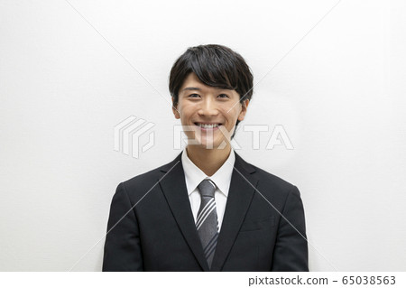 A young man in a suit A young man in a suit 65038563