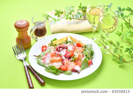 Octopus (octopus), baby scallop (boiled), salmon trout, baby leaf carpaccio style salad. 65038813