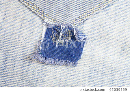 Jeans torn background, Denim texture. Jeans torn background, Denim texture. 65039569