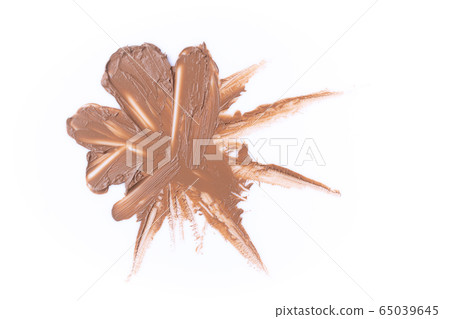Lipstick smear smudge swatch isolated on white background. Cream makeup texture. Bright biege color cosmetic product brush stroke swipe sample. Lipstick smear smudge swatch isolated on white background. Cream makeup texture. Bright biege color cosmetic product brush stroke swipe sample. 65039645