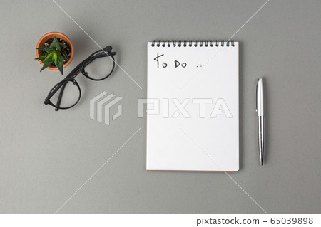 notebook, pen, glasses and green flower notebook, pen, glasses and green flower 65039898