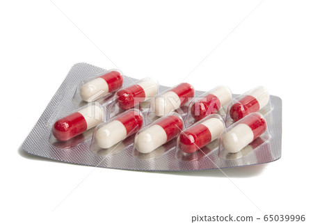 red-white capsules isolated 65039996