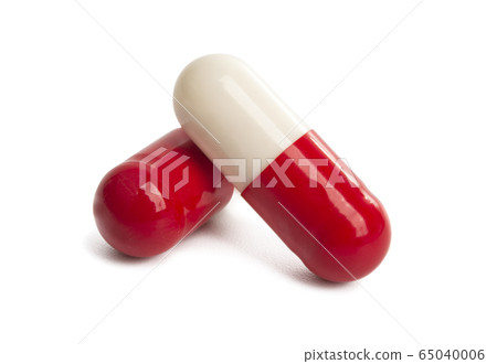 red-white capsules isolated 65040006