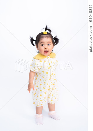 portrait of cute asian baby girl on white 65040833