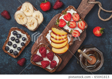 sandwiches with fruits and berries 65041813