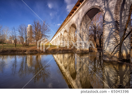 Reflection of the Rostokinsky aqueduct in Moscow 65043396