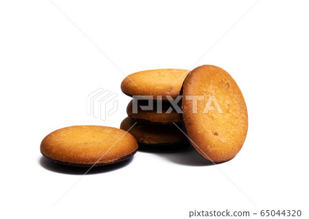 Round sponge cookies isolated on white background Round sponge cookies isolated on white background 65044320