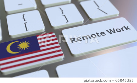 Remote Work text and flag of Malaysia on the computer keyboard. Telecommuting or telework related conceptual 3D rendering Remote Work text and flag of Malaysia on the computer keyboard. Telecommuting or telework related conceptual 3D rendering 65045385