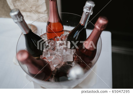 photo of Champaign in a bottles with ice photo of Champaign in a bottles with ice 65047295