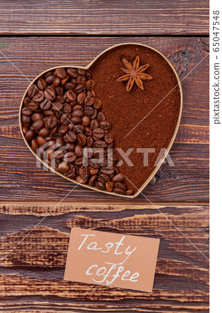 Heart-shaped coffee coffee beans and instant coffee. 65047548