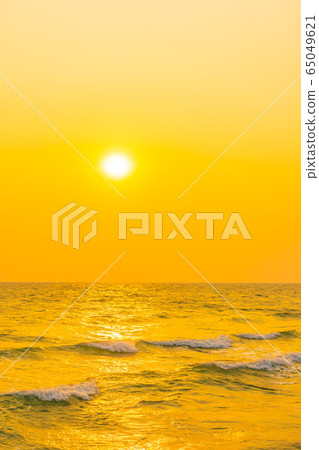Beautiful tropical nature of sea beach ocean at sunset or sunrise time 65049621