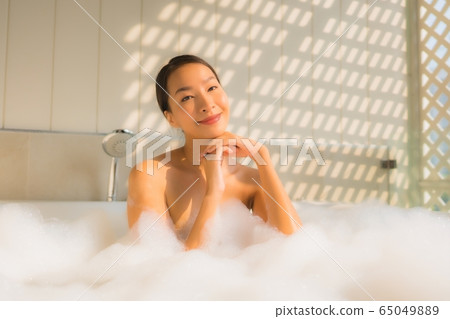 around outdoor swimming pool in hotel resort for travel in holiday vacation 65049889