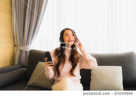 beautiful young asian woman enjoy with afternoon tea or breakfast floating on swimming pool beautiful young asian woman enjoy with afternoon tea or breakfast floating on swimming pool 65049994
