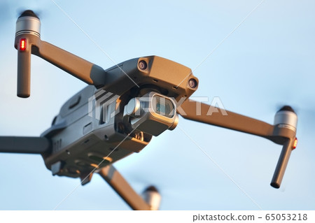 Drone flying outdoors Drone flying outdoors 65053218