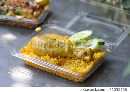 chicken rice or spiced rice steamed with chicken chicken rice or spiced rice steamed with chicken 65059566
