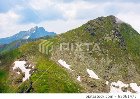 stunning landscape in high mountains. grass and stunning landscape in high mountains. grass and 65061475