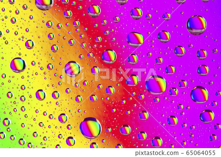 Abstract colorful background with multicolor drops of water on glass. 65064055