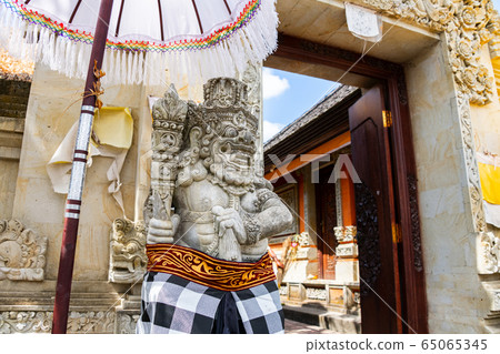Traditional stone statue in Bali Traditional stone statue in Bali 65065345