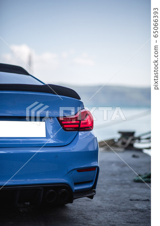 Blue design business class car in the port, view from behind Blue design business class car in the port, view from behind 65066393